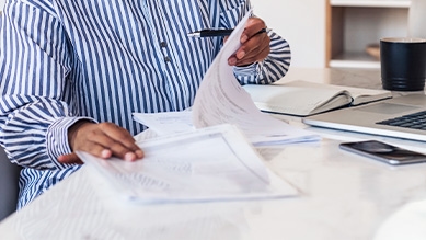 person checking paperwork